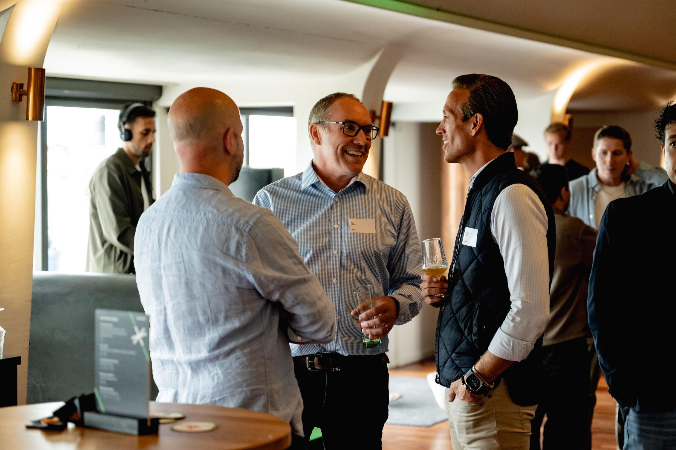 Guests enjoying drinks and talking