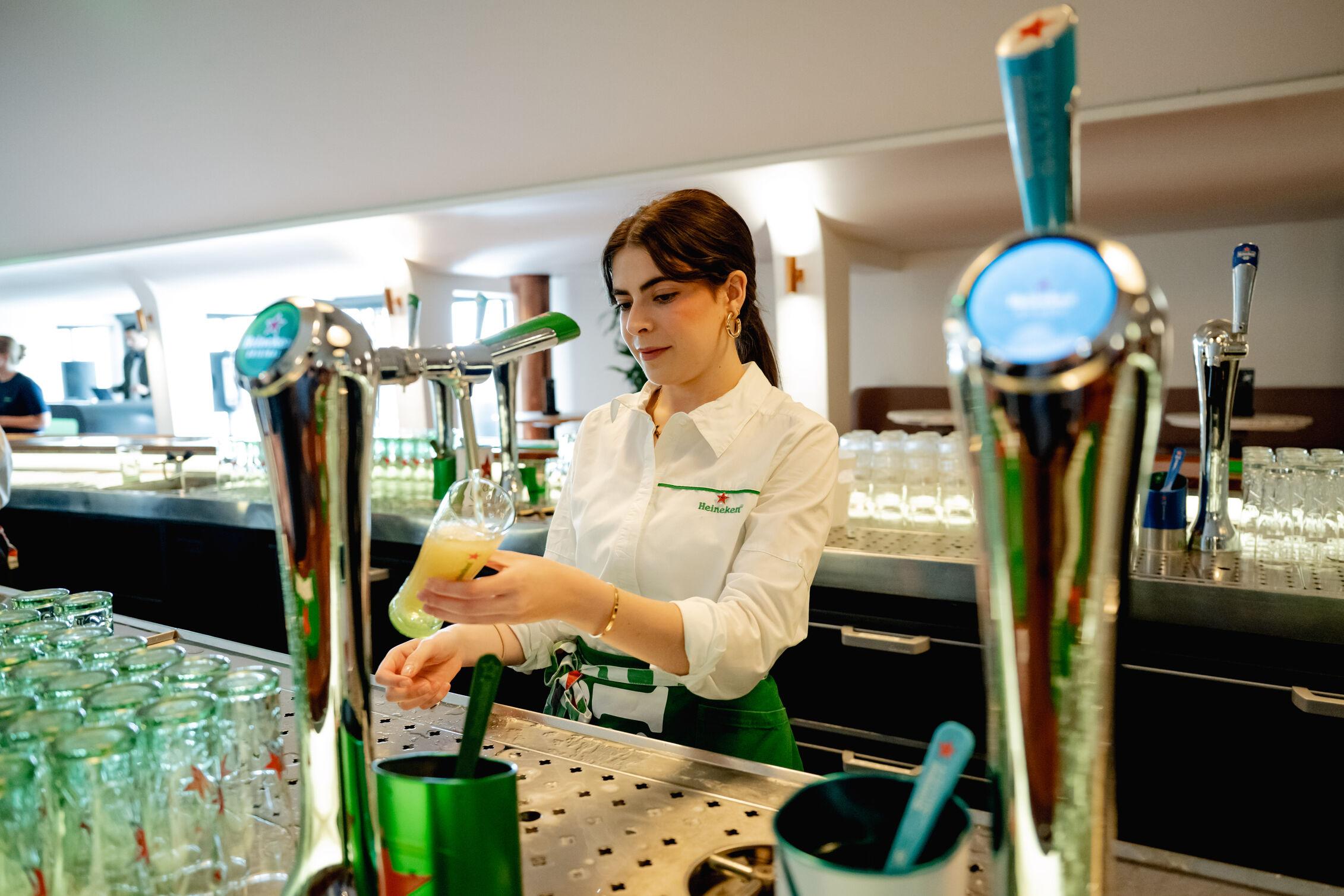 Bartender pouring drinks